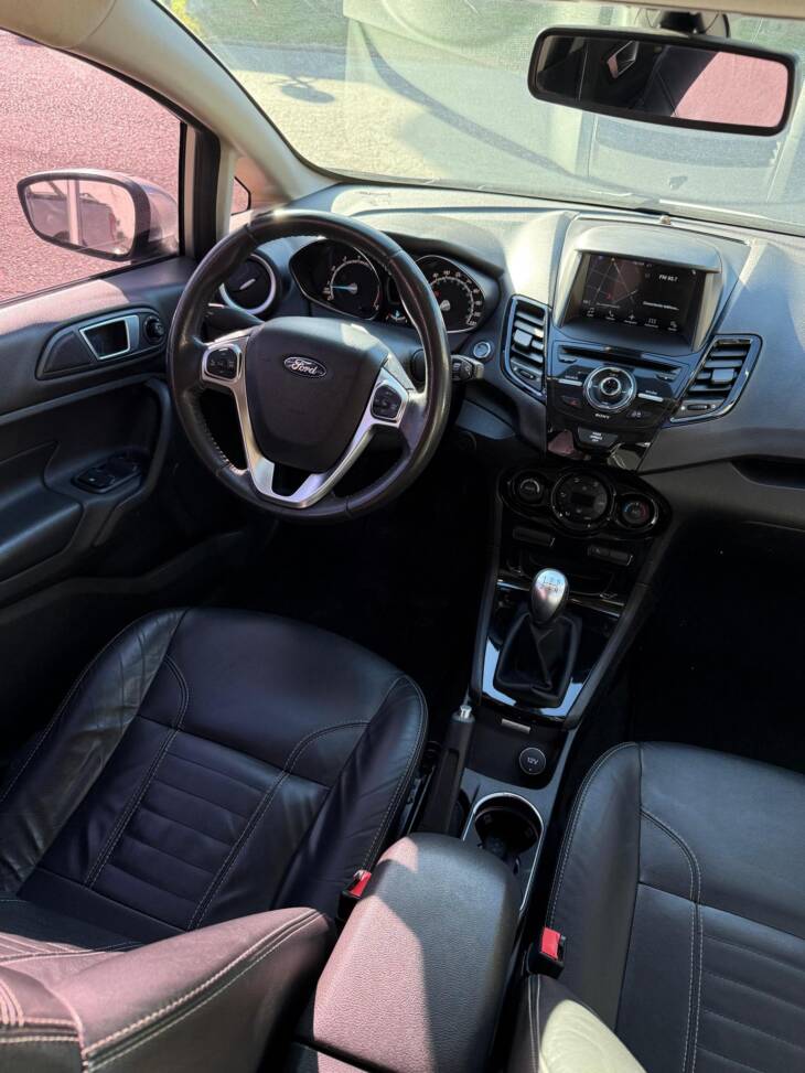 FIESTA 1.6 L 5 PUERTAS MANUAL TITANIUM año 2017 IMPECABLE! Financia Bco. Santander. Acércate a ORIO HNOS, SAN GENARO, concesionario oficial SHINERAY, DOMY Utilitarios - Imagen 10
