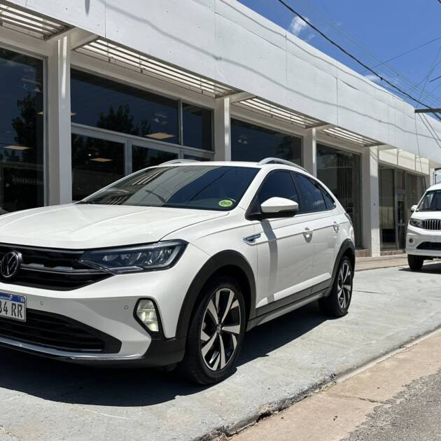 VW NIVUS HIGHLINE 200 TSI A/T año 2021 blanco con 83.000Km. IMPECABLE!! Financia Bco. Santander. Acércate a ORIO HNOS, SAN GENARO, concesionario oficial JMC, ISUZU, KAMA, LANDKING Camiones