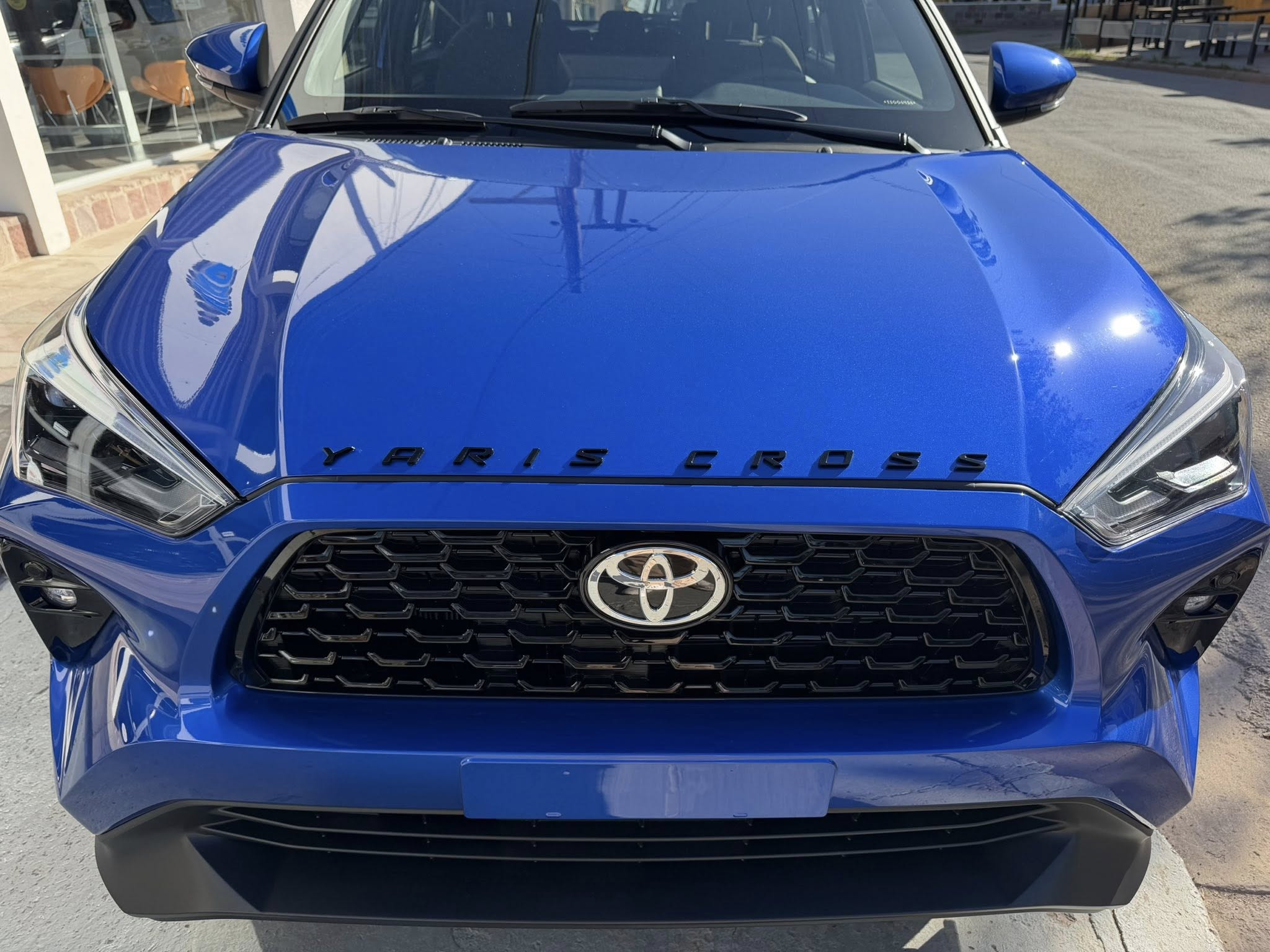 TOYOTA YARIS CROSS XEI HEV eCVT 0Km MY2026 azul metalizado. disponible. Financia Bco. Santander. Acércate a ORIO HNOS, SAN GENARO, concesionario oficial FORTHING suv - Imagen 14